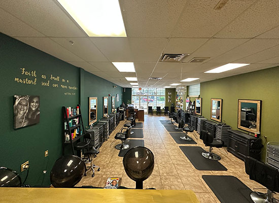 full view of interior and hair stylist stations
